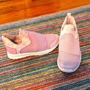 Purple and white slip on sneakers.